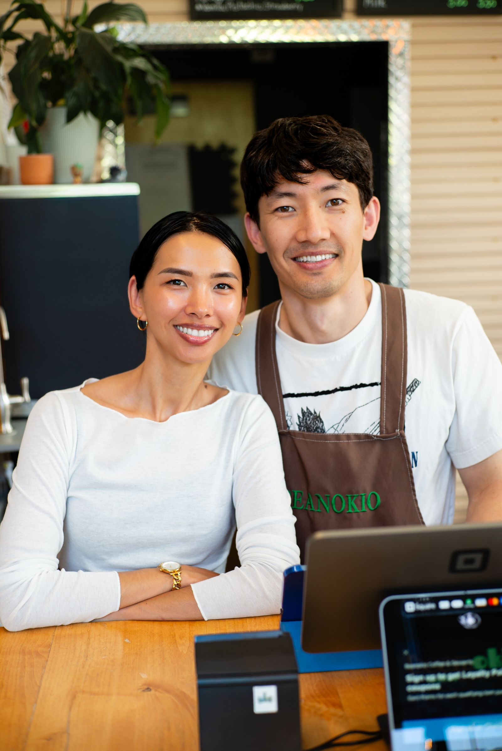 Small business owners at their counter